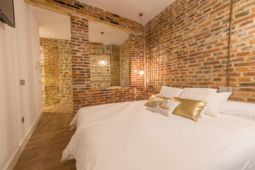 מלון לאון Albany Ancha מראה חיצוני תמונה A bedroom at the hotel