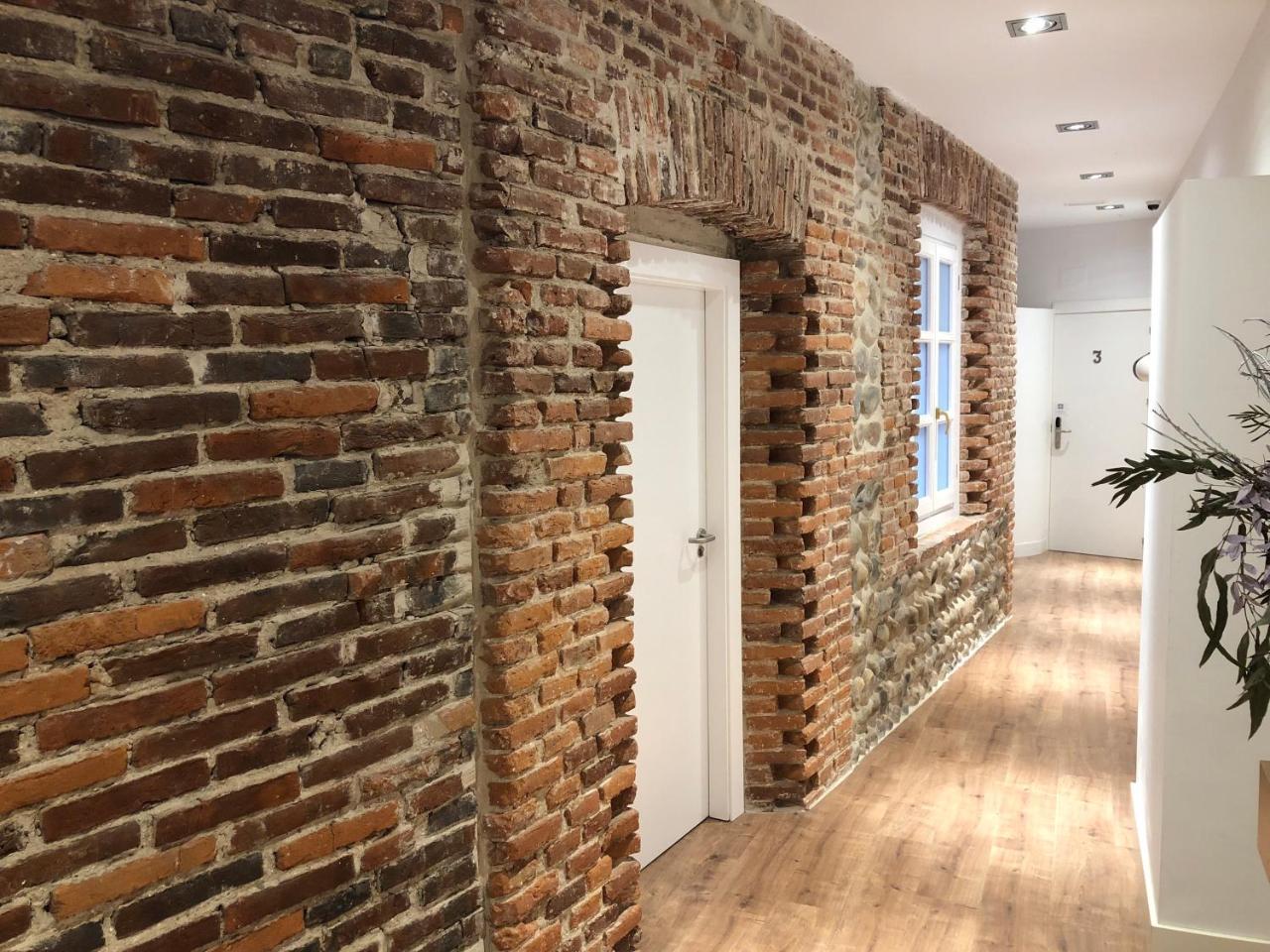 מלון לאון Albany Ancha מראה חיצוני תמונה The interior of the building